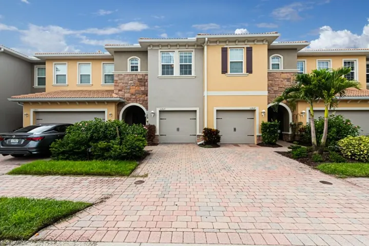 View of front of property featuring a garage