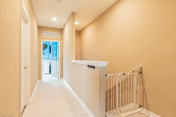 Hall featuring wood-type flooring