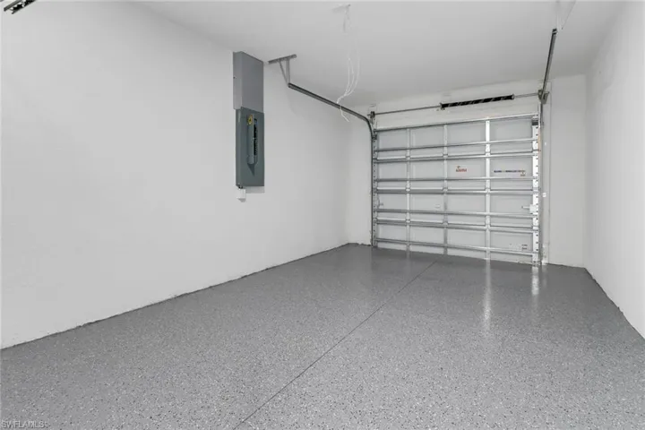 Garage featuring electric panel