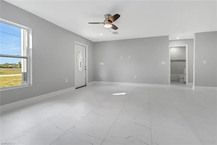 Spare room featuring ceiling fan