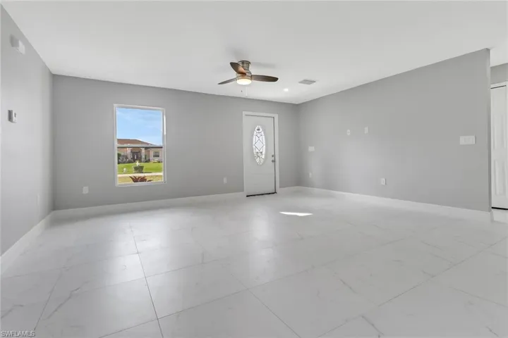 Foyer with ceiling fan