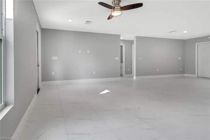 Unfurnished room with ceiling fan