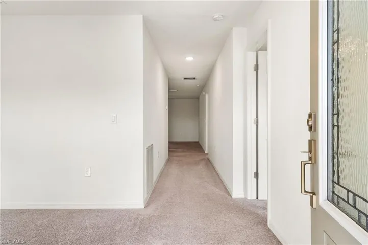 Corridor with light carpet