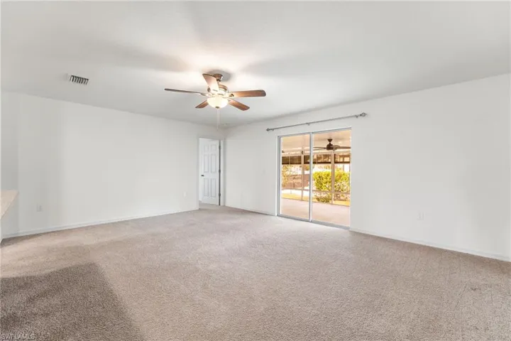 Empty room featuring carpet floors