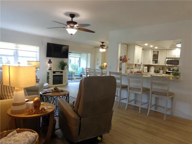 VERY OPEN FLOORPLAN, SHOWCASES THE GORGEOUS FINISHES AND DECOR IN THIS HOME.  THE KITCHEN IS QUITE LARGE, WITH UPGRADED ALL-WOOD CABINETRY, A PANTRY, LAZY SUZAN, PULL-OUT SPICE CABINET, LARGE S/S SINK. QUARTZ COUNTERS, STAINLESS APPLIANCES, SOFT CLOSE DOORS AND DRAWERS AND THE LIST GOES ON AND ON!