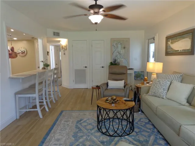 THIS IS A PORTION OF THE LIVING ROOM.  YOU'LL IMMEDIATELY NOTICE THE WONDERFUL, CROSS-LIGHTING DUE TO THE MANY, WELL-PLACED WINDOWS IN THIS HOME.