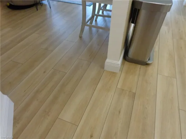 BEAUTIFUL FLOORING THROUGHOUT.  (THE BATHROOMS HAVE AN UPGRADED, STYLISH TILE FLOORING)