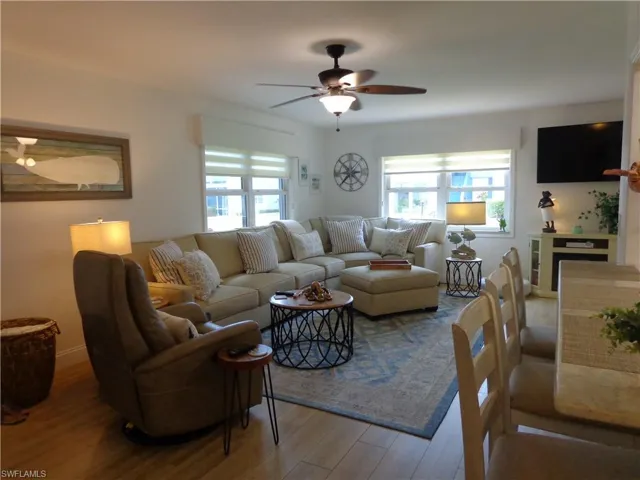NOTICE THE SIZE AND OPEN SPACE IN THIS EXQUISITE LIVING ROOM!  YOU'LL ALSO ENJOY THE BREAKFAST BAR, WHICH IS UNIQUE TO THIS UNIT.