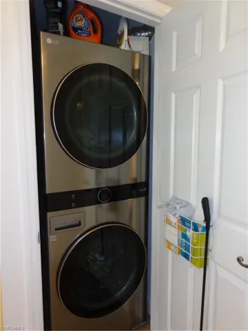 FULL SIZE WASHER AND DRYER LOCATED IN THE HALLWAY