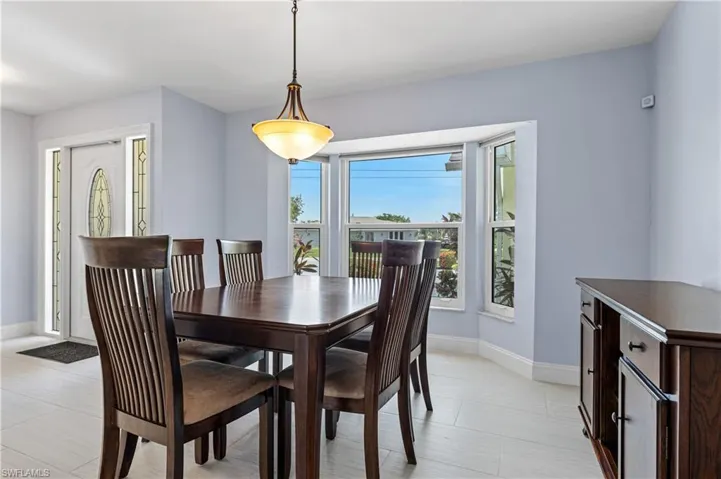 Dining space featuring baseboards