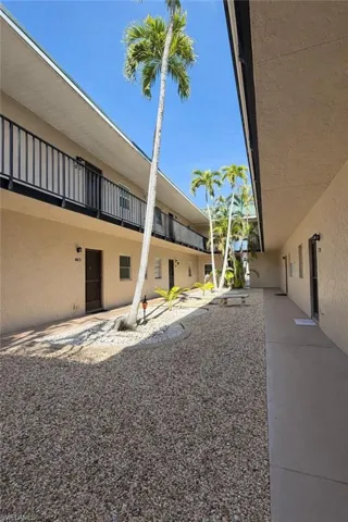 View of yard featuring a balcony