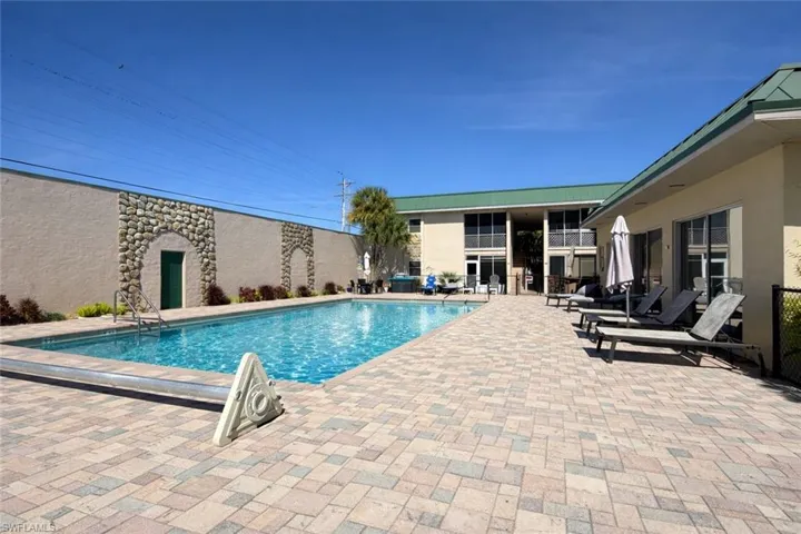 Swimming pool with a patio