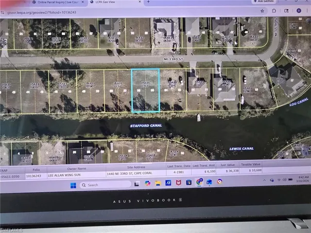 Aerial overview of property's location featuring property boundaries highlighted