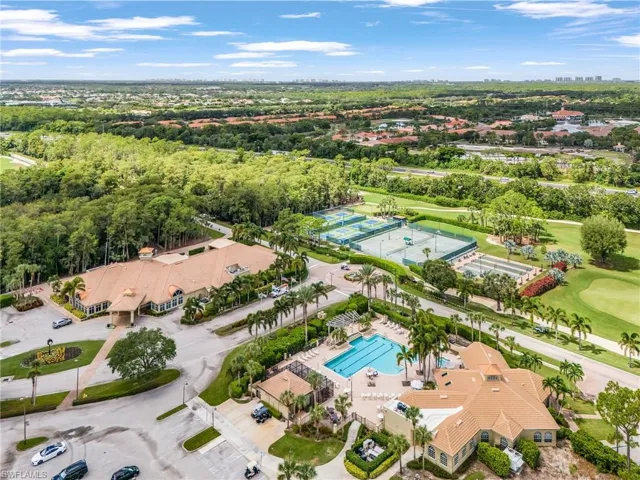 Aerial view of a pool and a golf course