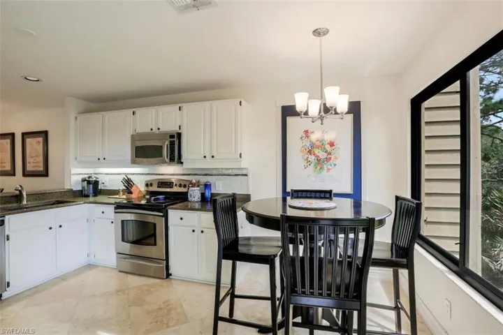 Charming and spacious eat in kitchen, overlooking the golf course.