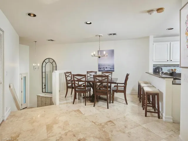 View from living area into dining and kitchen.
