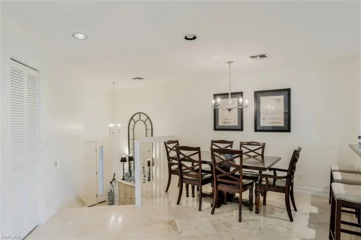 Large dining area open to the living room and kitchen.