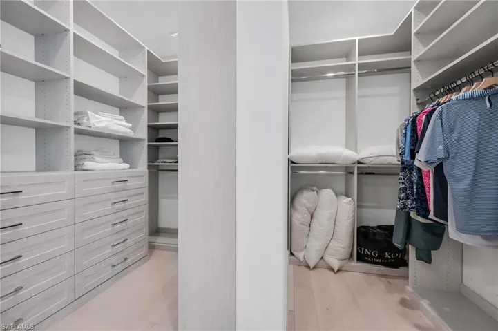 Dual walk-in closets, with an abundance of storage space