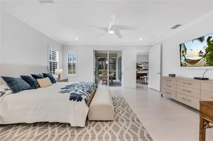 Easy access via sliders to lanai from primary bedroom