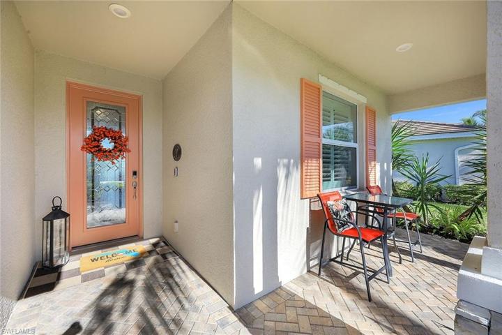 Front lanai surrounded by tropical plants