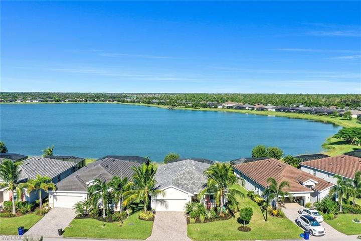 Aerial view of home and lake