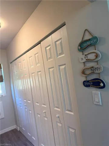 Detailed view of wood finished floors and baseboards