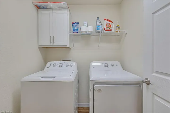 Enjoy having full size washer and dryer inside + cabinet space