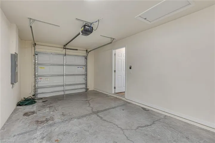 1-car garage that can be used as a exercise room, office, game room or just park your car!!