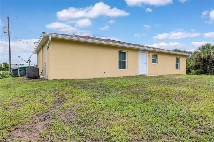 Rear view of property with large size backyard!!!