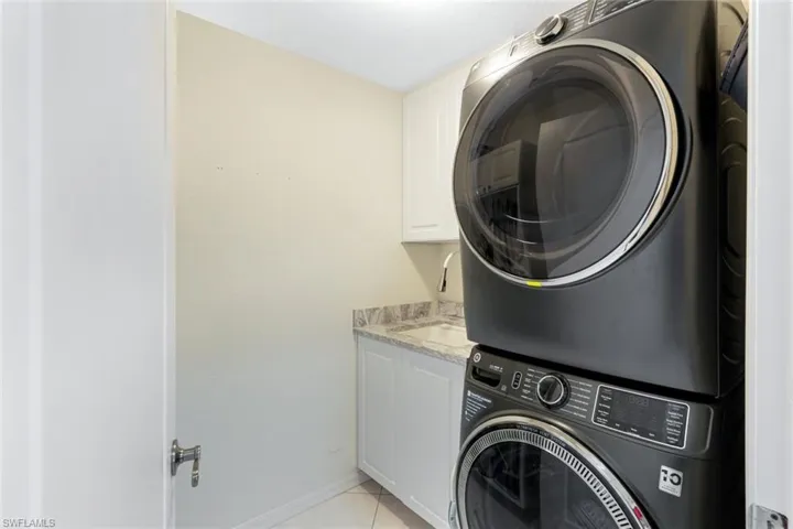 RECONFIGURED WITH UTILITY SINK AND CABINETRY.