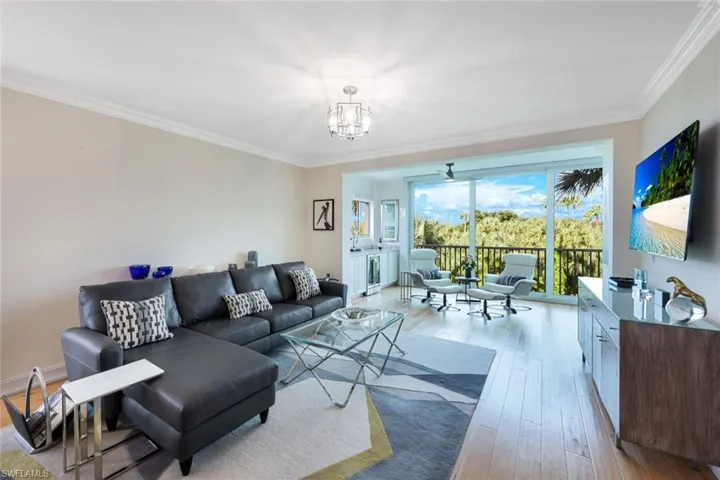 GREAT ROOM OPENS TO EXPANDED LANAI.
