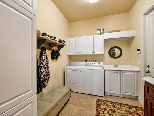 Laundry W/ Storage inside Residence