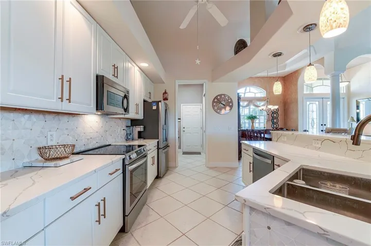 Laundry room and garage at center rear