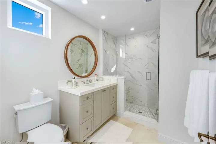 Guest bathroom with a large walk-in shower.