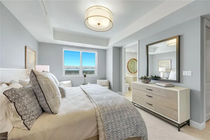 Situated away from the primary suite on the opposite side of the home, this bedroom provides a secluded and private retreat.