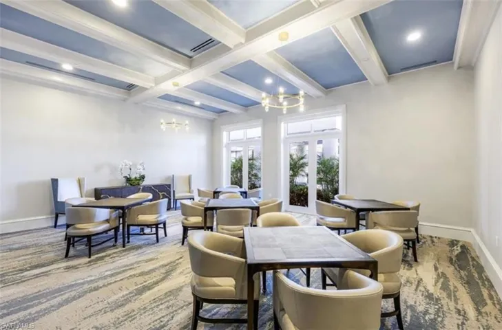 The updated amenity center also includes a card room.