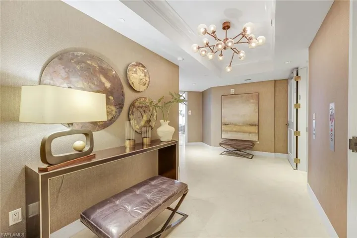 Step off the elevator into a space defined by neutral tones and thoughtfully appointed furnishings.