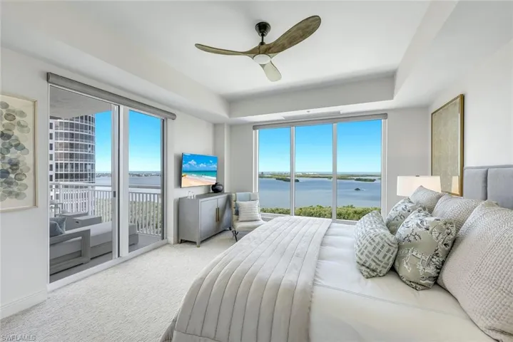With private lanai access, this bedroom creates a tranquil indoor-outdoor retreat.