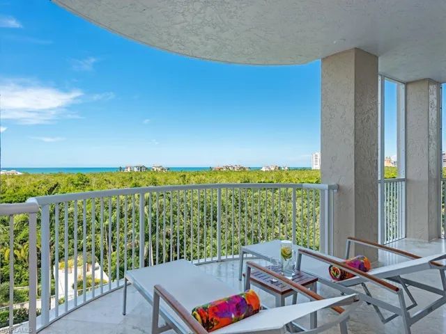 Large balcony with panoramic Gulf, sunset views