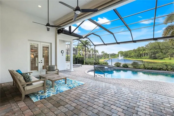 Pool and lanai area with expansive lake view.
