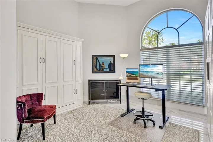 Den with a Murphy bed and organized closet area across from Murphy Bed.  Excellent room for overflow of guests.