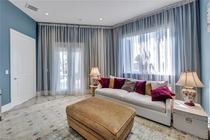 This is a guest en-suite, owners currently have it set up a a TV relaxing room with a Murphy bed but there is plenty of room to put a King bed and chaise relaxing chair. This room has a closet in the beautifully renovated bathroom. Guest Room with direct access to your resort pool.