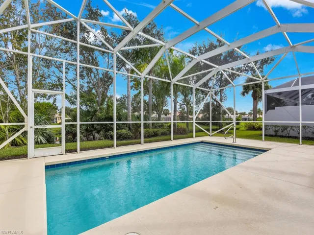 View of pool featuring a lanai and a patio