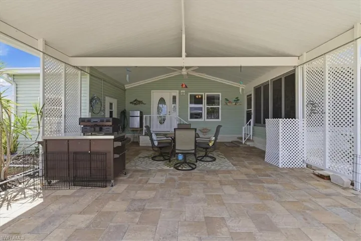 View of patio with outdoor dining space