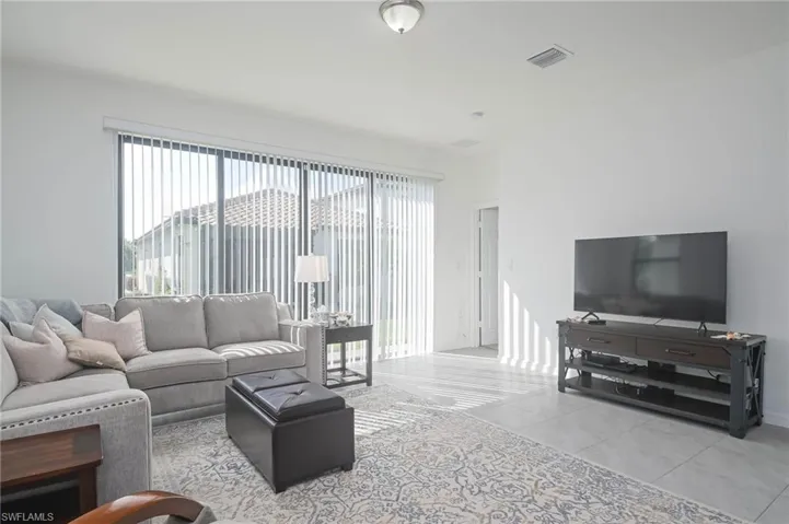 View of tiled living room