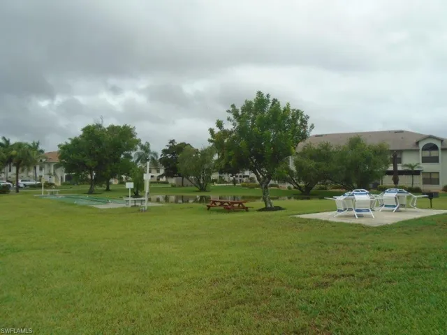 View of home's community featuring a yard