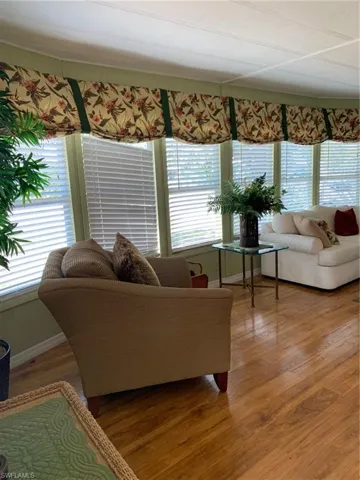 Living room with light wood finished floors