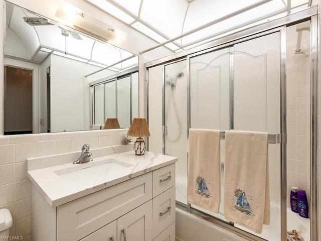 Hall bathroom with tub/shower is in original part of home. In addition, the original second bath is off bedroom # 3 and has a walk-in shower.