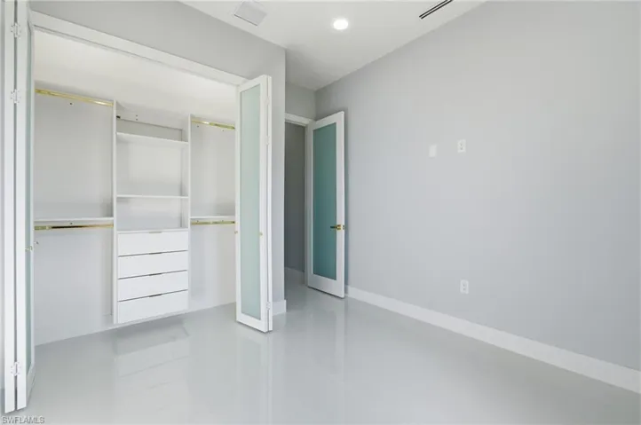 Unfurnished bedroom featuring a closet and recessed lighting