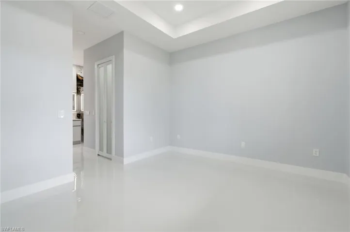 Spare room featuring recessed lighting and light tile patterned floors